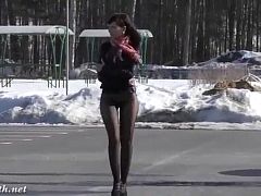 Jeny Smith testing black seamless pantyhose outdoors